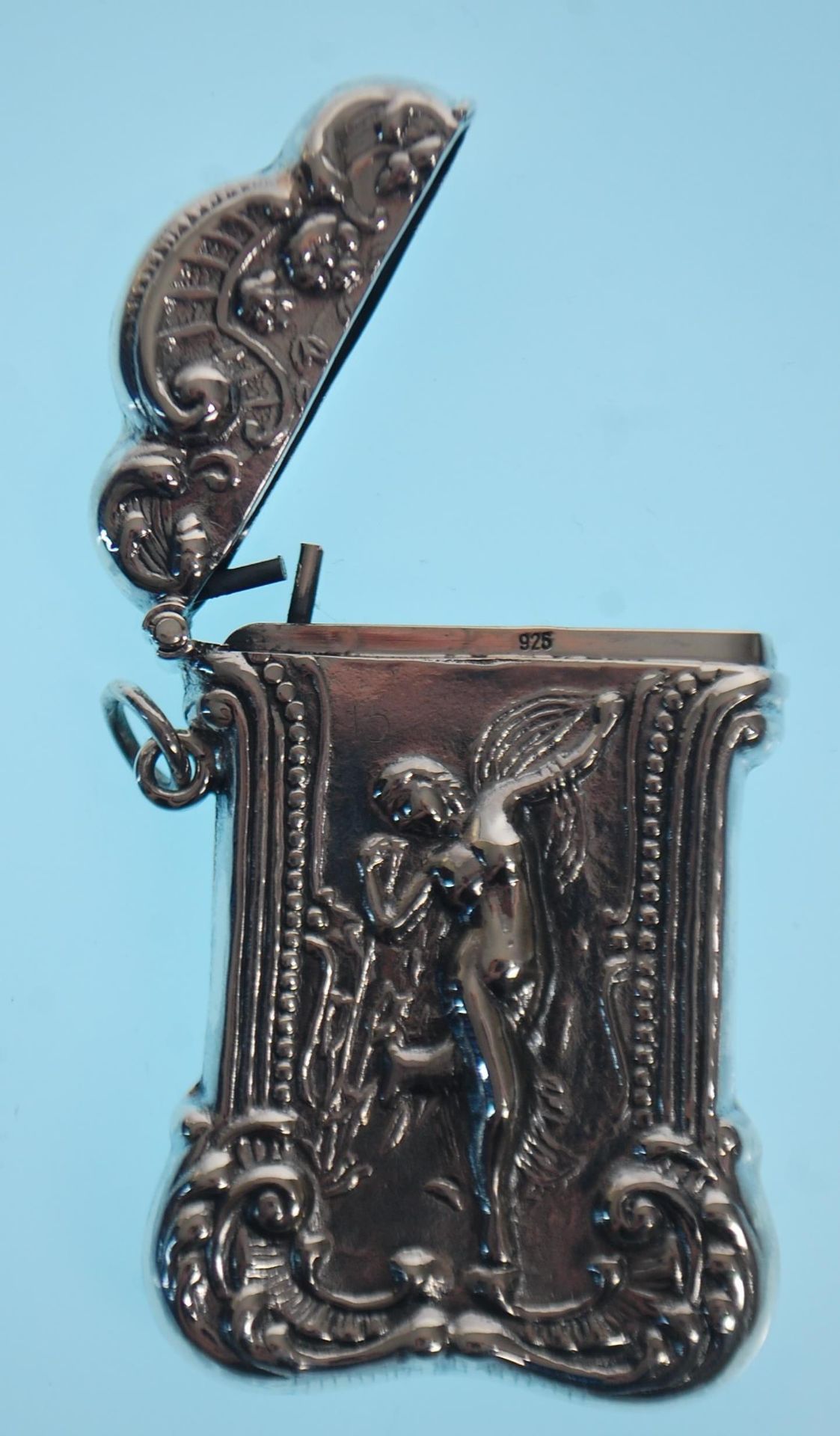 A stamped 925 silver vesta case having a repousse decoration fairy with scrolled borders. Measures - Image 4 of 7