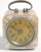 A lovely vintage 20th Century miniature brass and mother of pearl alarm clock of cube form having