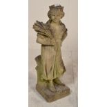 An early 20th Century antique reconstituted stone garden ornament / statue in the form of a young
