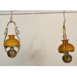 A contemporary pair of antique style large brass hanging lantern of oil lamp type with modern