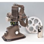A good vintage retro 20th Century Bell & Howell - Gaumont film projector model 613. Within