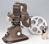 A good vintage retro 20th Century Bell & Howell - Gaumont film projector model 613. Within
