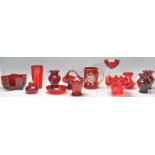 A mixed group of vintage and retro 20th Century studio art glass in cranberry, red and ruby flash