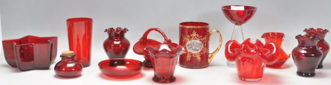 A mixed group of vintage and retro 20th Century studio art glass in cranberry, red and ruby flash