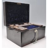 A 19th century Coromandel ladies travelling workbox - jewellery box. Of square form with button