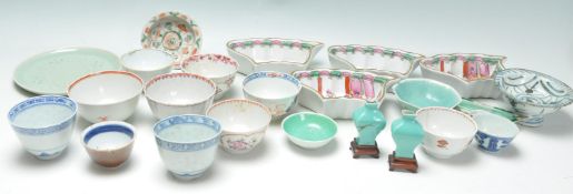 A mixed group of Chinese ceramics dating from the early 19th Century to include mostly tea bowls,