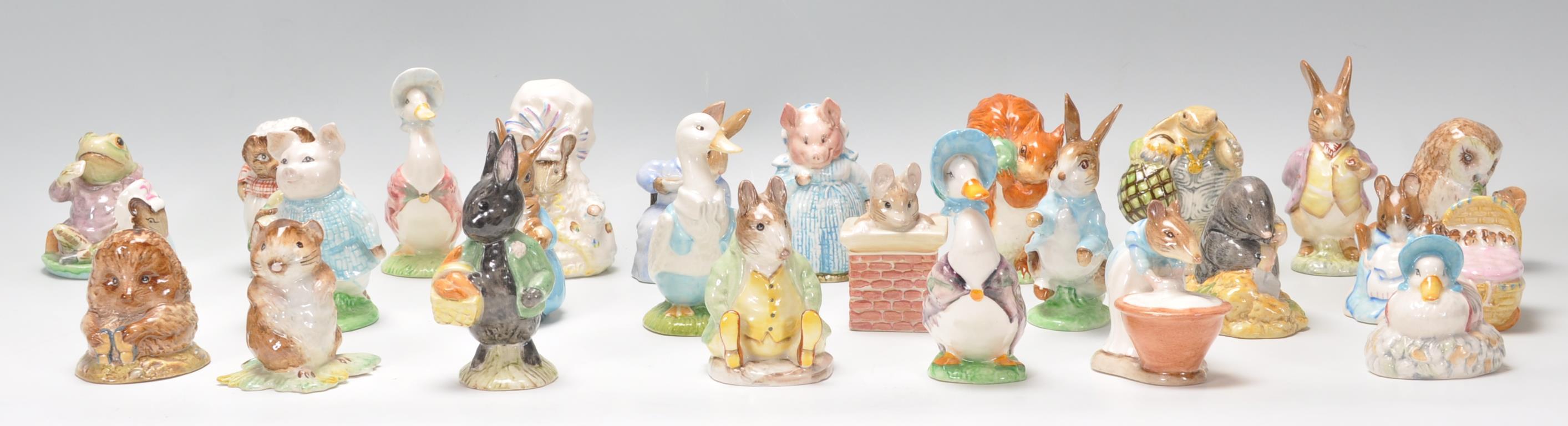 A collection of twenty five Beswick Beatrix Potter figurines to include Mrs Tiggy Winkle, Mr