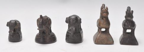 A group of 18th / 19th Century Chinese bronze opium weights to include three moulded as elephants