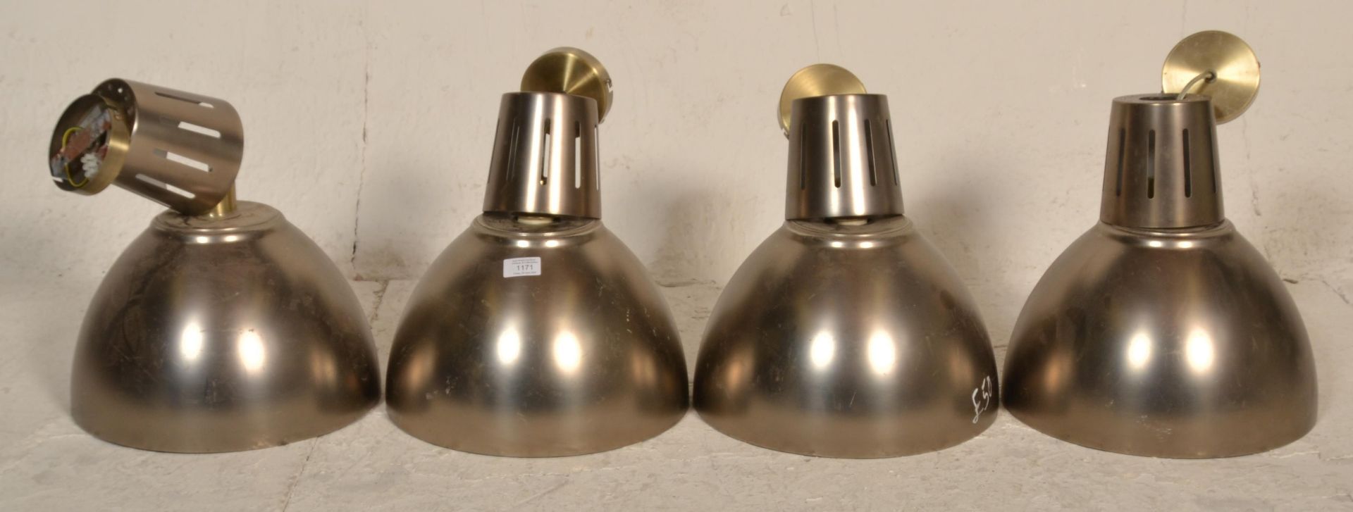 A set of 4 contemporary factory / Industrial style brushed gold aluminium pendant lights each with