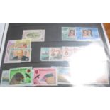 A collection of 1st day covers together with a collection of vintage postcards to include Bristol,