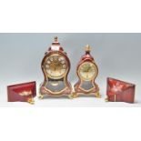 A pair of 20th Century antique style mantel clocks to include one marked Elux and the other Du