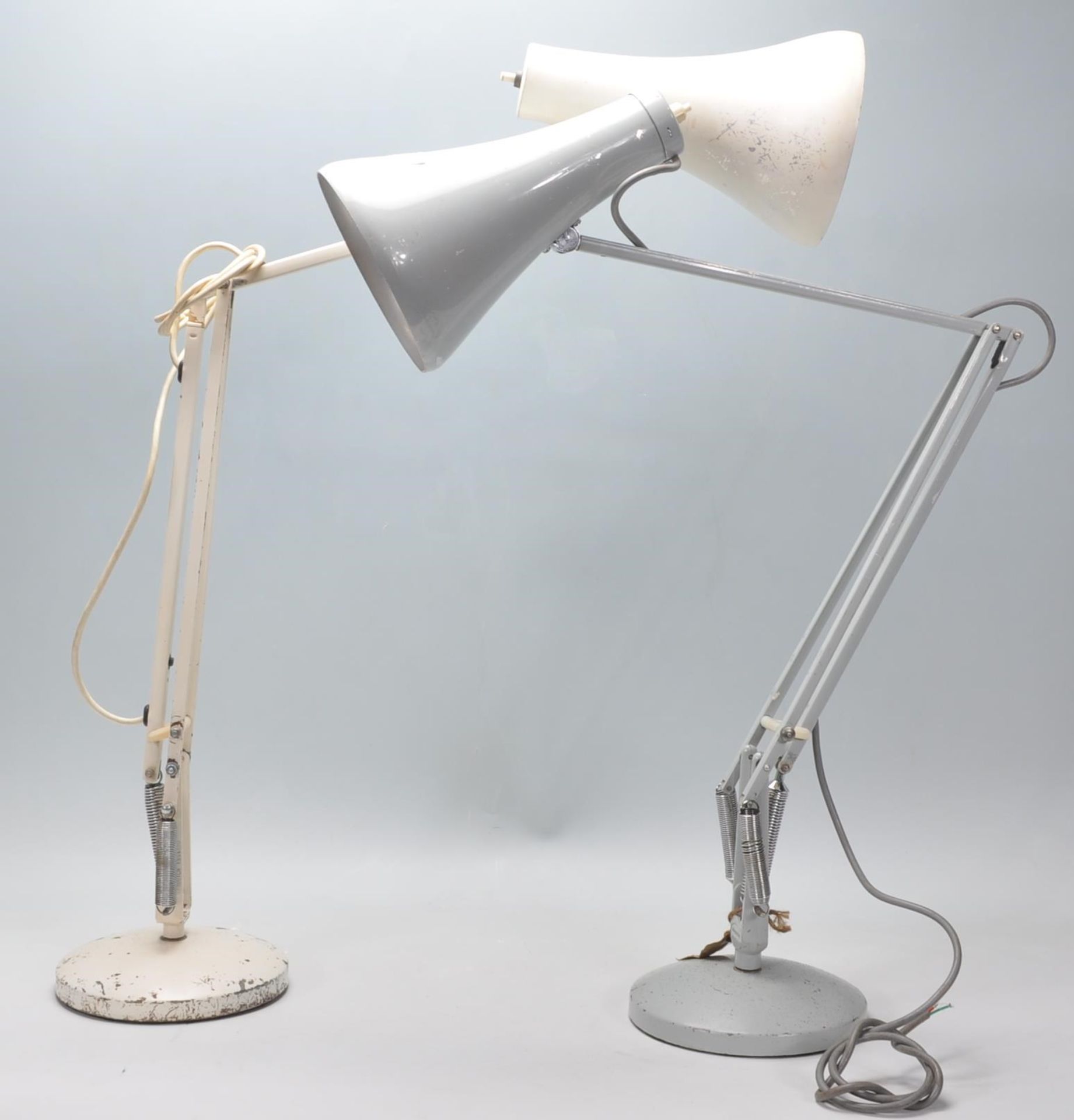 Two vintage retro 20th Century Industrial Herbert Terry anglepoise desk / table lamps. One in a