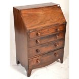 A 19th Century Georgian mahogany bureau of small proportions having one small drawer above three