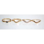 A hallmarked 9ct yellow gold ladies ring ring set with a central blue. Ring size R. Together with