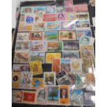 A good collection of stamps to include many philatelic auction lots of stamps inlcuding Kenyan 5/