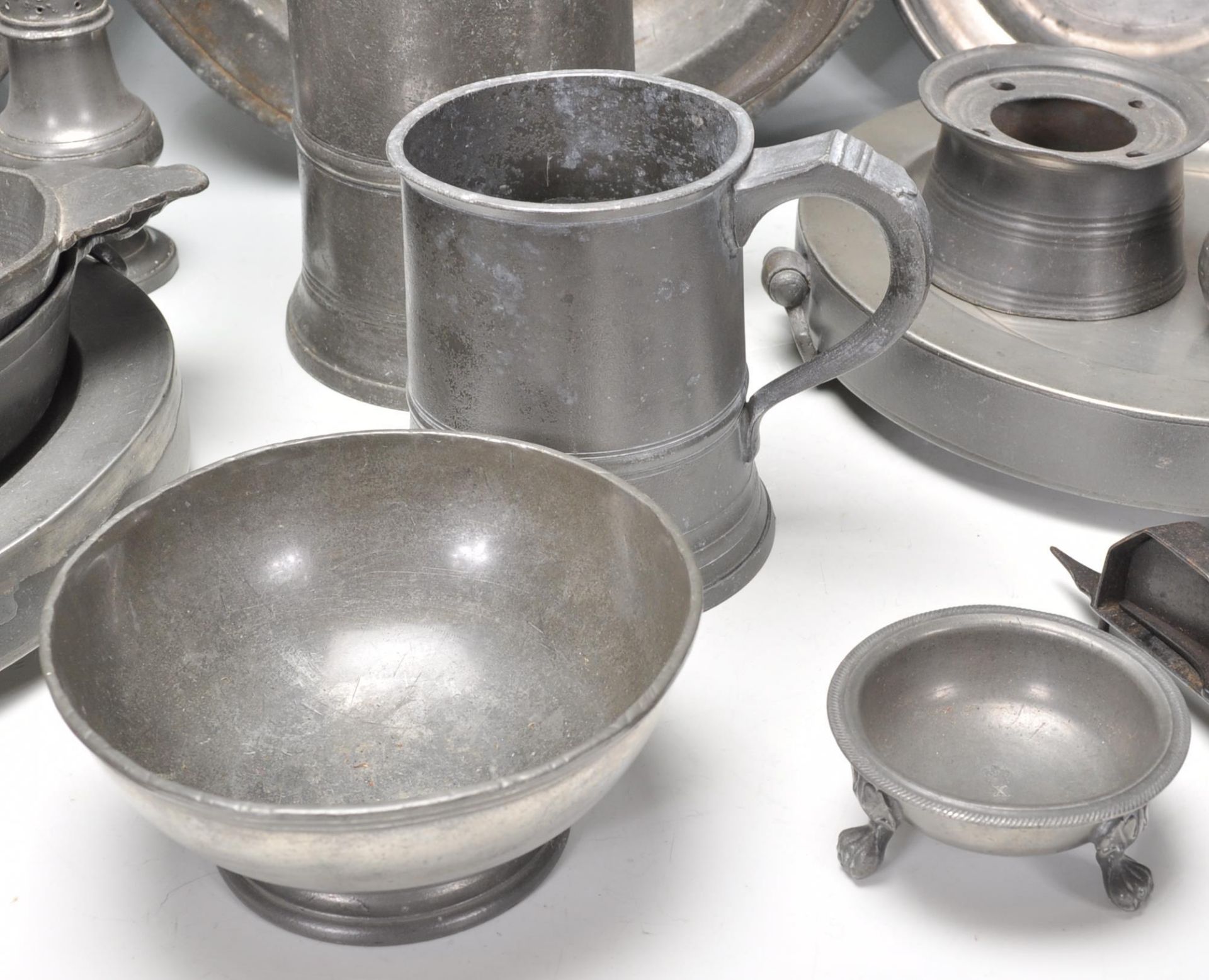 A collection of 18th Century antique pewter wares to include a large selection of plates and - Image 3 of 11