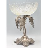 A good 20th Century silver plate table centerpiece in the form of a palm tree having a cut glass