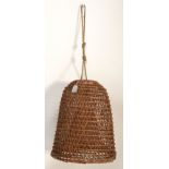 Two vintage early 20th Century wicker fish catchers / fish traps. One specifically for els.