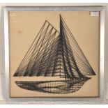 A vintage 20th Century sailing related picture of a boat created using mound black threads on a