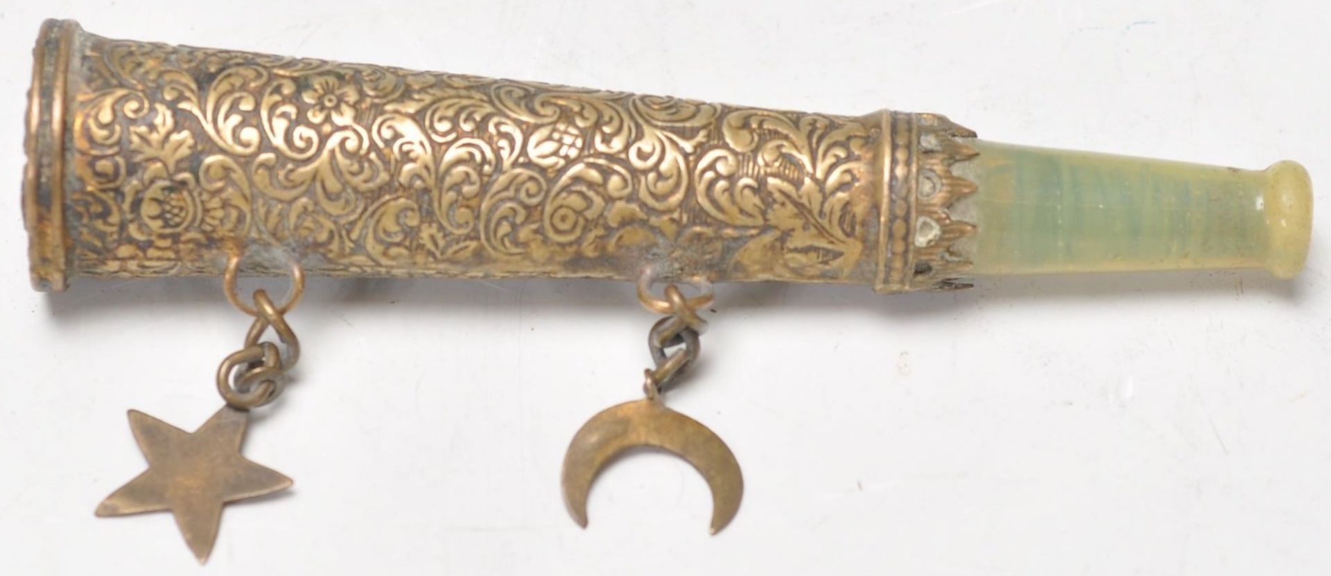 A vintage early 20th Century Middle Eastern / Islamic style brass cheroot holder having a engraved