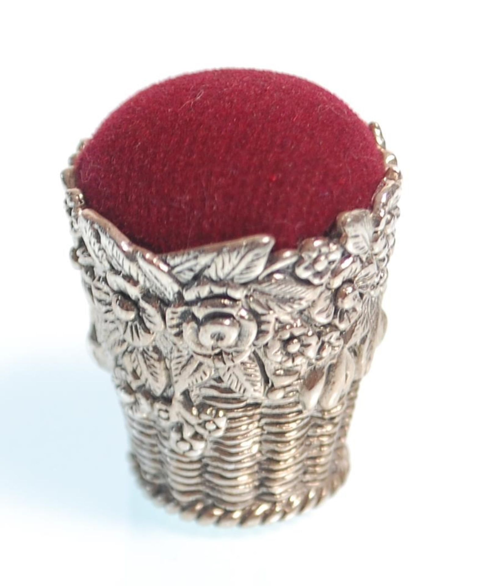 A stamped 925 silver pin cushion in the form of a basket having raised floral decoration with a - Image 2 of 7