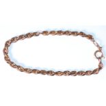 A stamped 375 9ct gold bracelet having a rope twist chain with a spring ring clasp. Measures 8