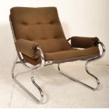 A retro mid century Chrome upholstered easy chair - armchair. Raised on stunning tubular chrome