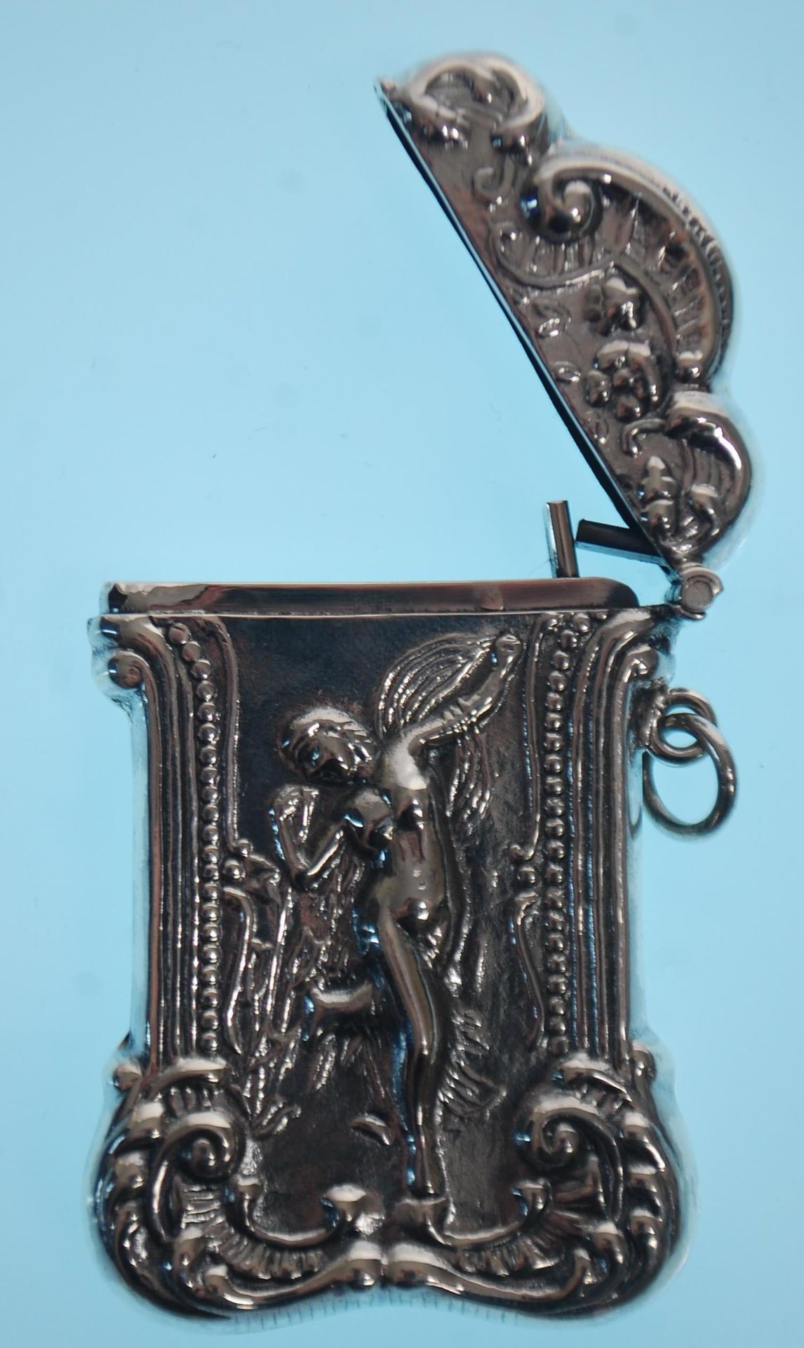 A stamped 925 silver vesta case having a repousse decoration fairy with scrolled borders. Measures - Image 5 of 7