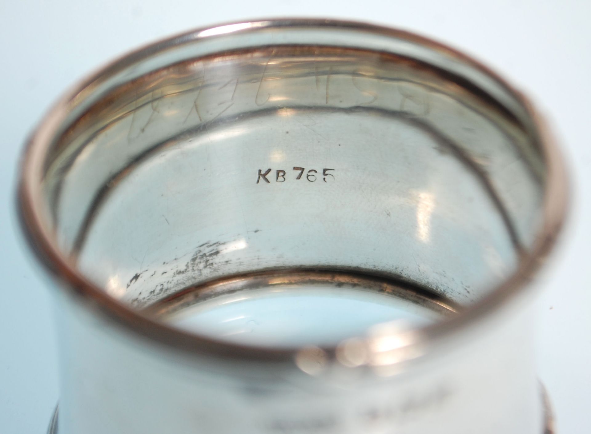 Two silver hallmarked napkin rings to include one with gadrooned borders and engraved initials to - Image 4 of 6