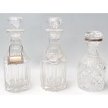 A good pair of 19th century heavy lead glass decanters of shaped and angled form complete with