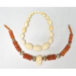 A 19th Century heavy bone bead necklace having seventeen graduating beads. Together with a stained