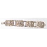 An early 20th Century Art Deco Egyptian revival silver white metal bracelet having pharaohs head