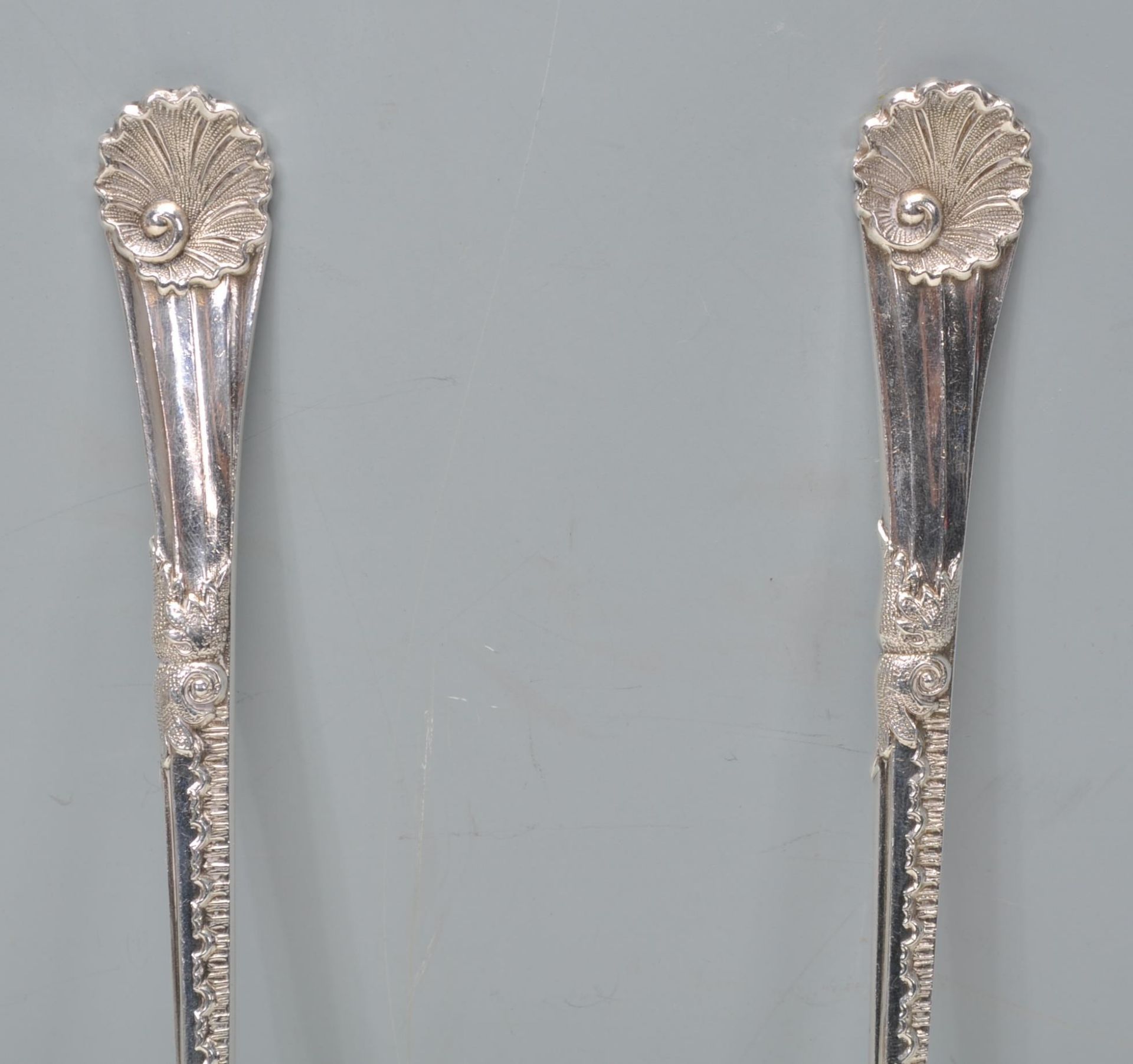 A set of Walker and Hall silver servers having scrolled design handles with shell terminals. - Image 4 of 10