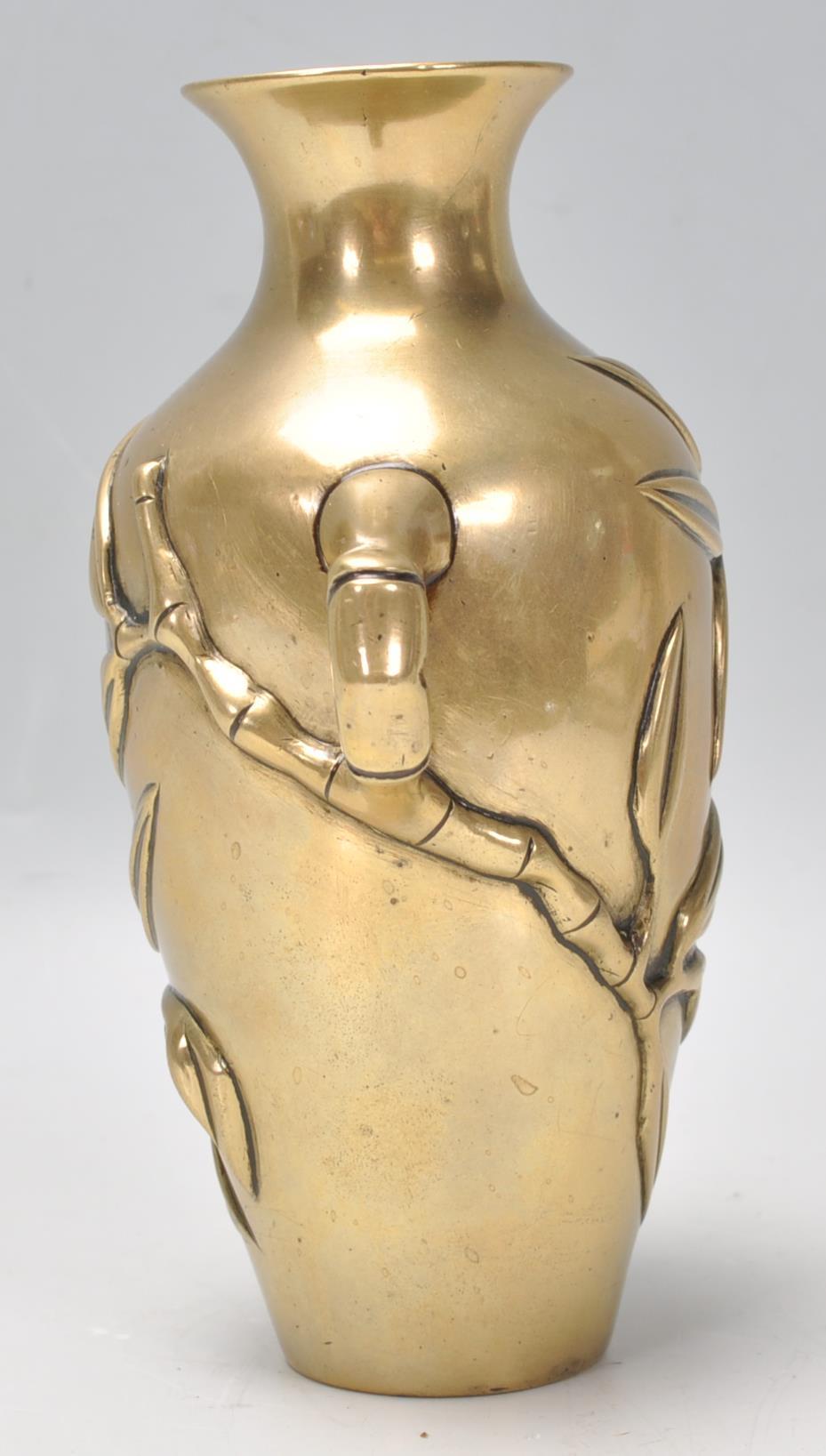 A believed 19th century Chinese brass / bronze twin handled vase having cast and embellished - Image 2 of 6
