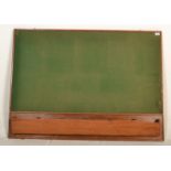 A mid century vintage village hall  notice board with baize lined centre in wooden surround having
