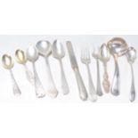 A collection of American silver flatware to include a Sterling stamped ladle, 1909 dated sterling