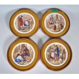 A collection of wooden framed pot lid type porcela