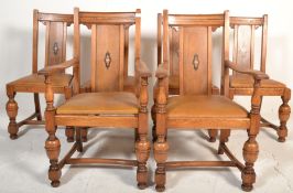 A good set of 6 Edwardian oak inlaid dining chairs being raised on cup and cover supports united