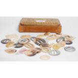 A collection of mother of pearl belt buckles including round, oval and rectangular shaped buckles