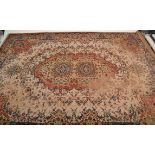 A large early 20th century Persian / Islamic rug with beige ground having central medallion design ,