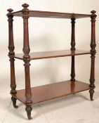 A 19th Century Victorian mahogany whatnot / etagere having three rectangular shelves supported by