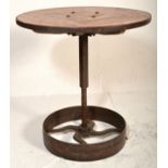 A good 20th century upcycled Industrial cafe table. Raised on Industrial trolley - tram wheel base