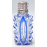 A lovely 19th Century Victorian blue tinted thick cut glass scent bottle having a silver hinged