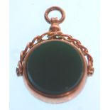 A Victorian 9ct / 375 Chester hall marked swivel fob with bloodstone agate. Chester hallmarked for