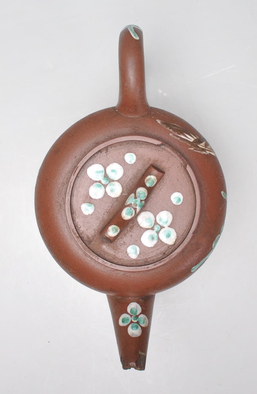 An early 20th Century Chinese brown clay teapot having hand enameled bird and floral decoration with - Image 5 of 8