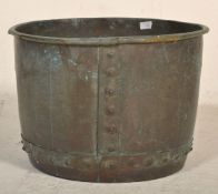A large 19th Century Victorian copper planter of hammered construction with banding and flared out