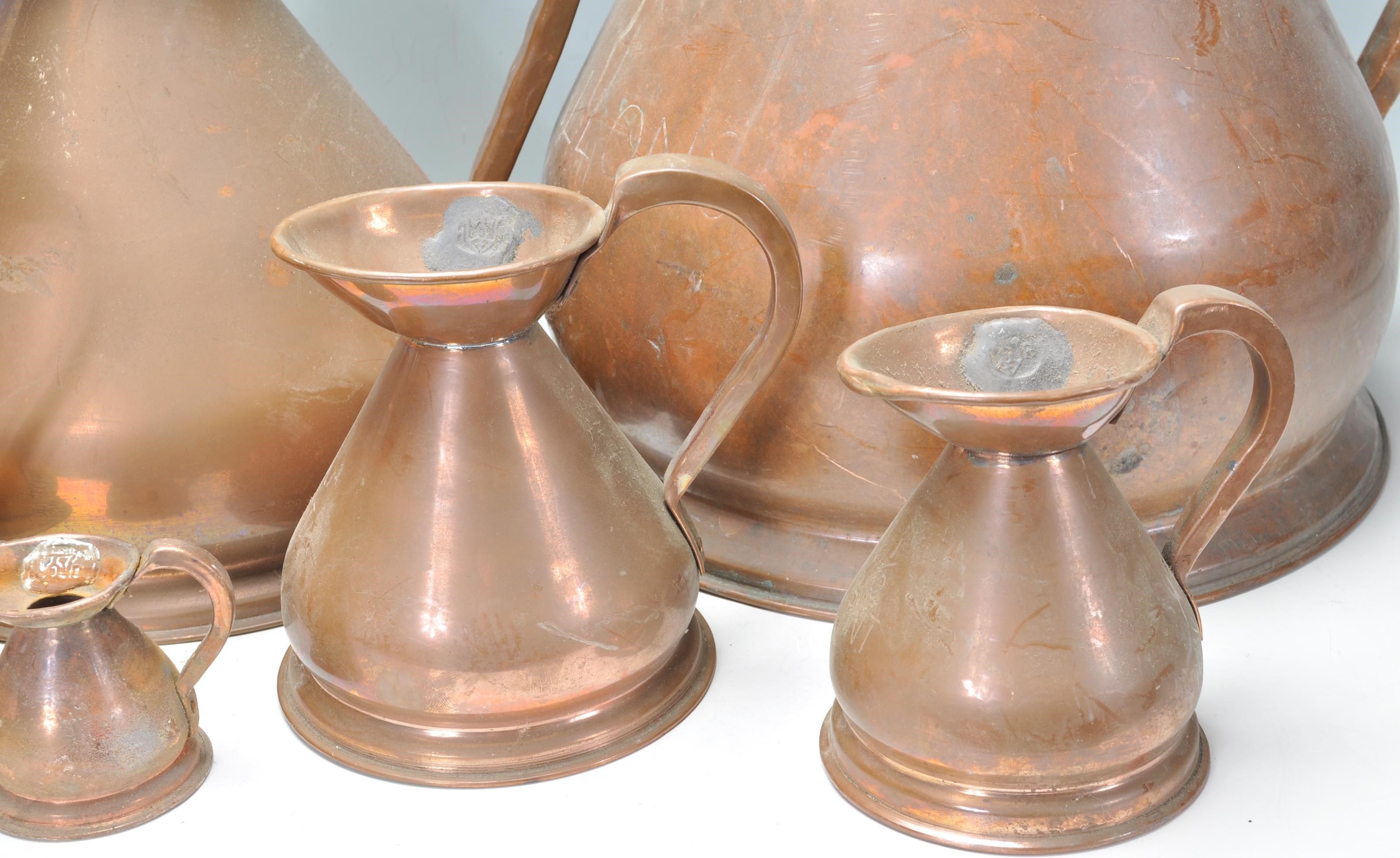 A set of large 19th century Victorian type copper cider jugs - measures. Each of graduating - Image 3 of 9