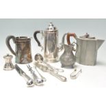 A collection of silver plated wares to include a good Gm Co EP coffee pot, Arts & Crafts Tudric type