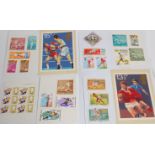 Stamp Album - Pictures of the World of Sport. Many examples of stamps to include uncirculated from