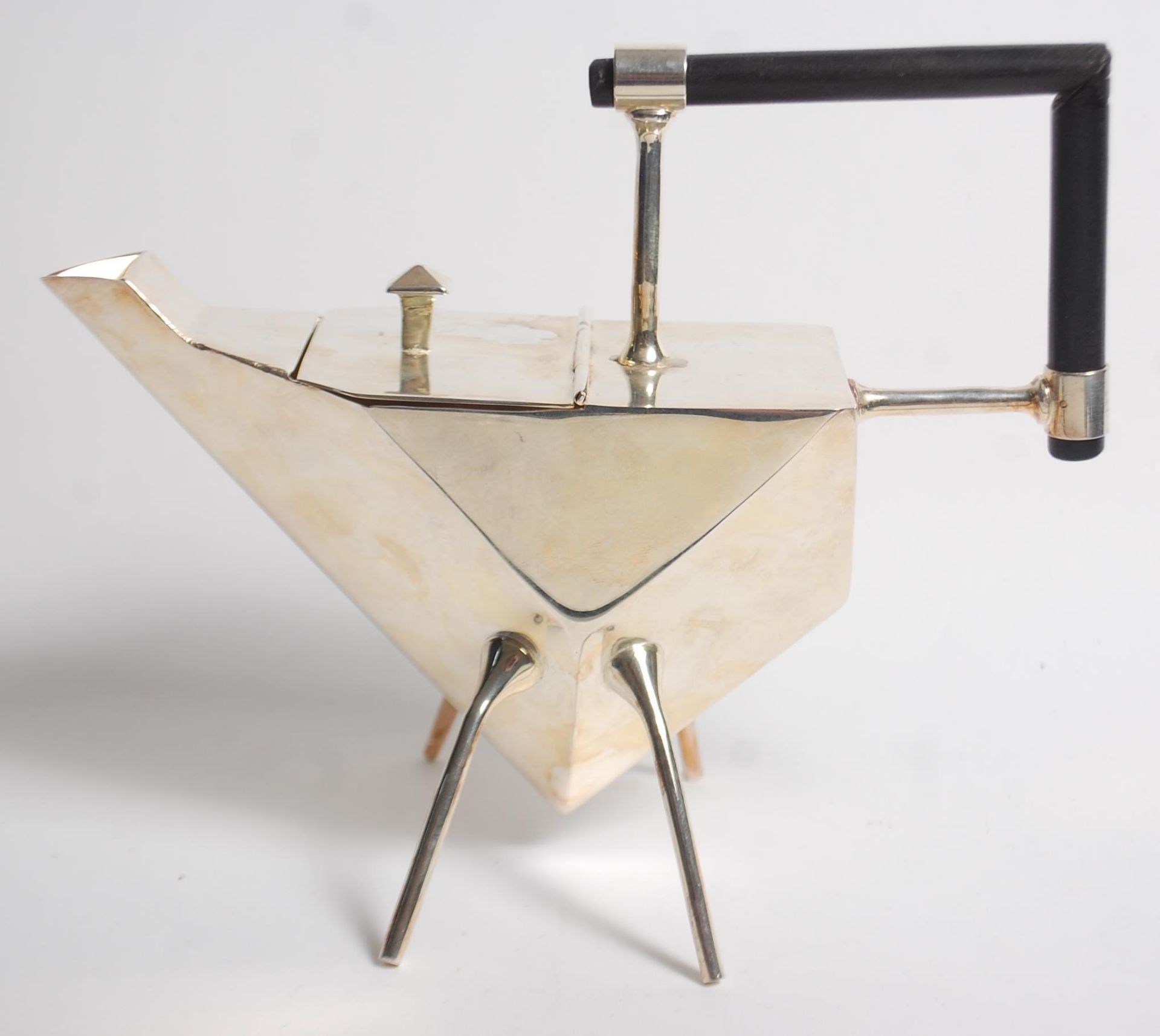 A 20th Century silver plated tea pot in the style of Christopher Dresser, being of angular form with - Image 7 of 7